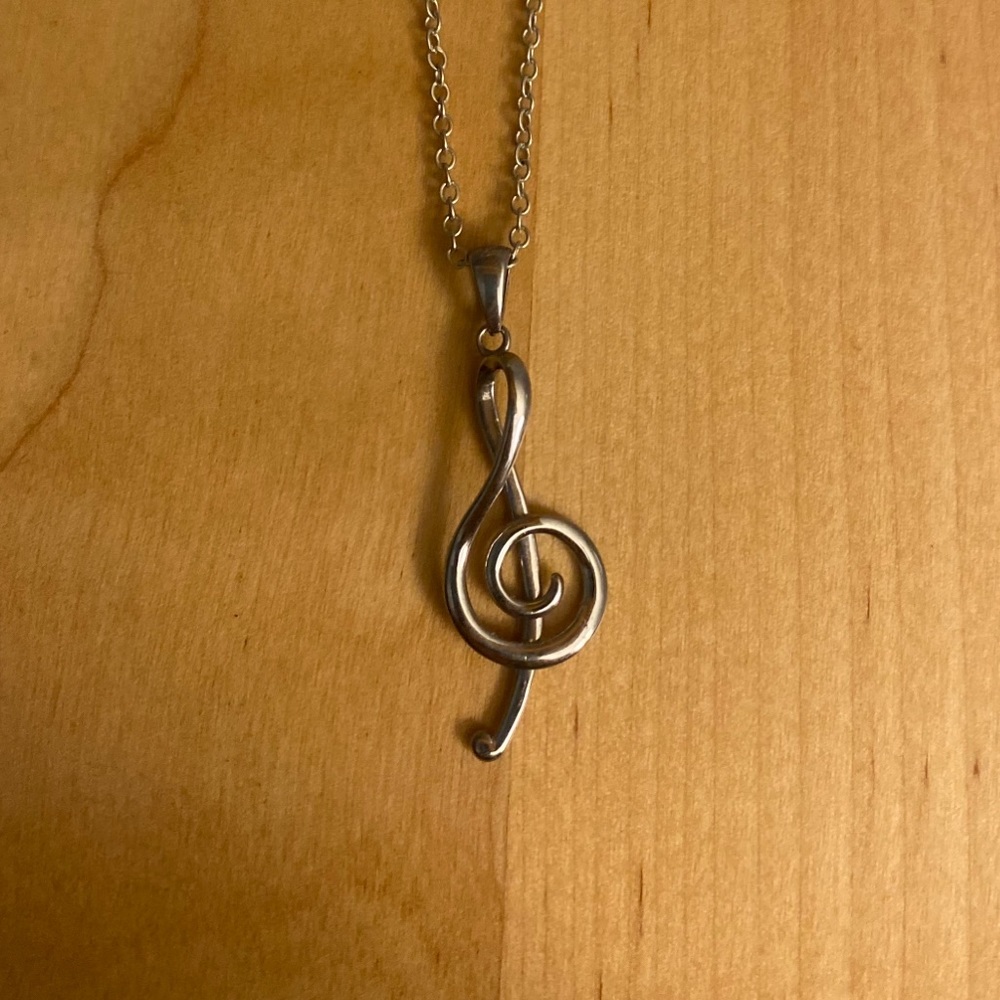 Treble clef necklace